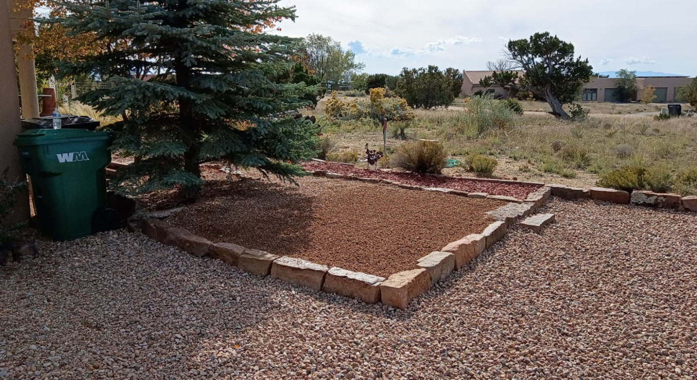 Residential Landscaping Project: Stone Retaining Edges and Gravel Surfacing