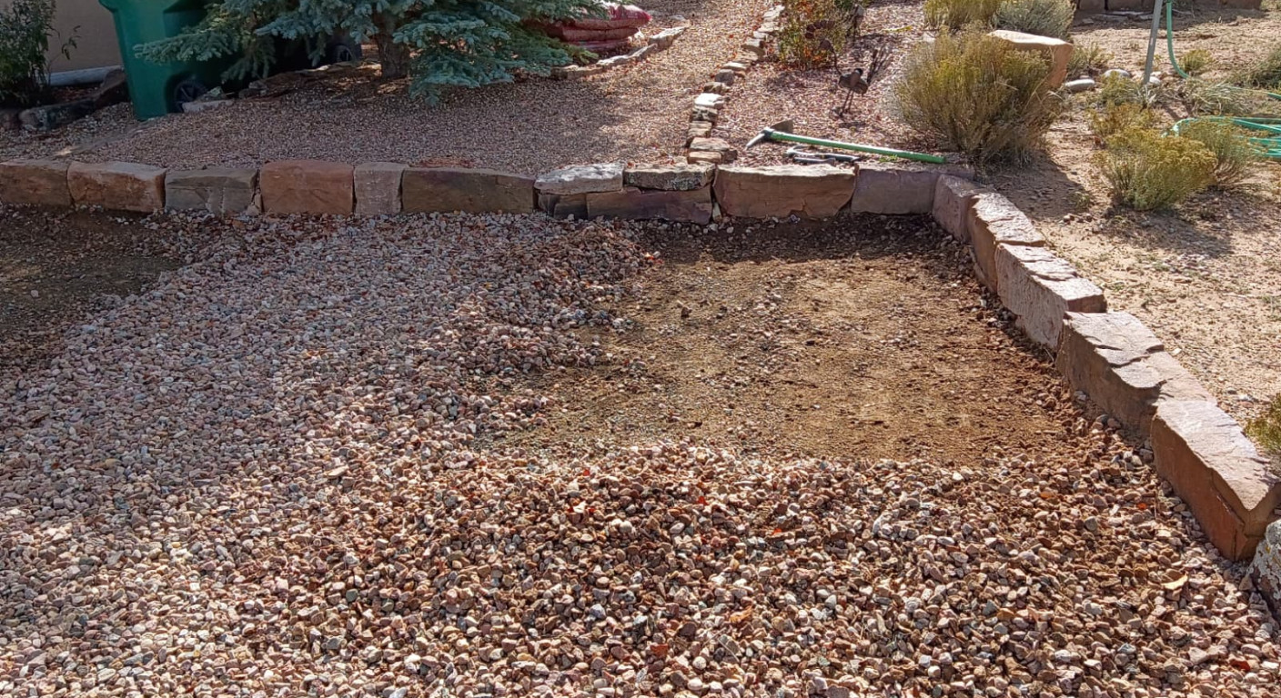 Residential Landscaping Project: Stone Retaining Edges and Gravel Surfacing