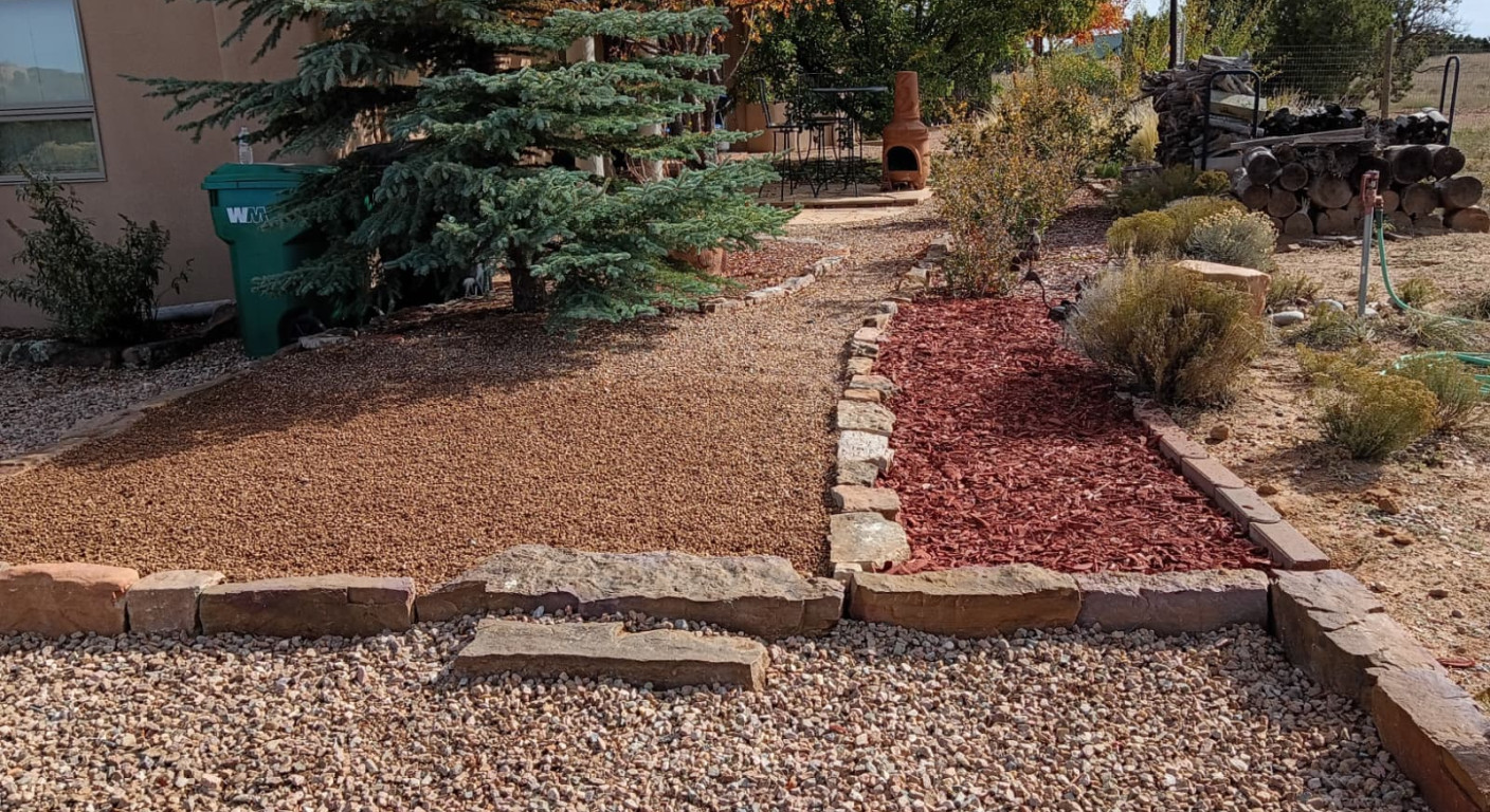 Residential Landscaping Project: Stone Retaining Edges and Gravel Surfacing